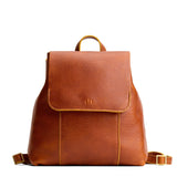 Sienna | Leather backpack with magnetic flap closure on a white background