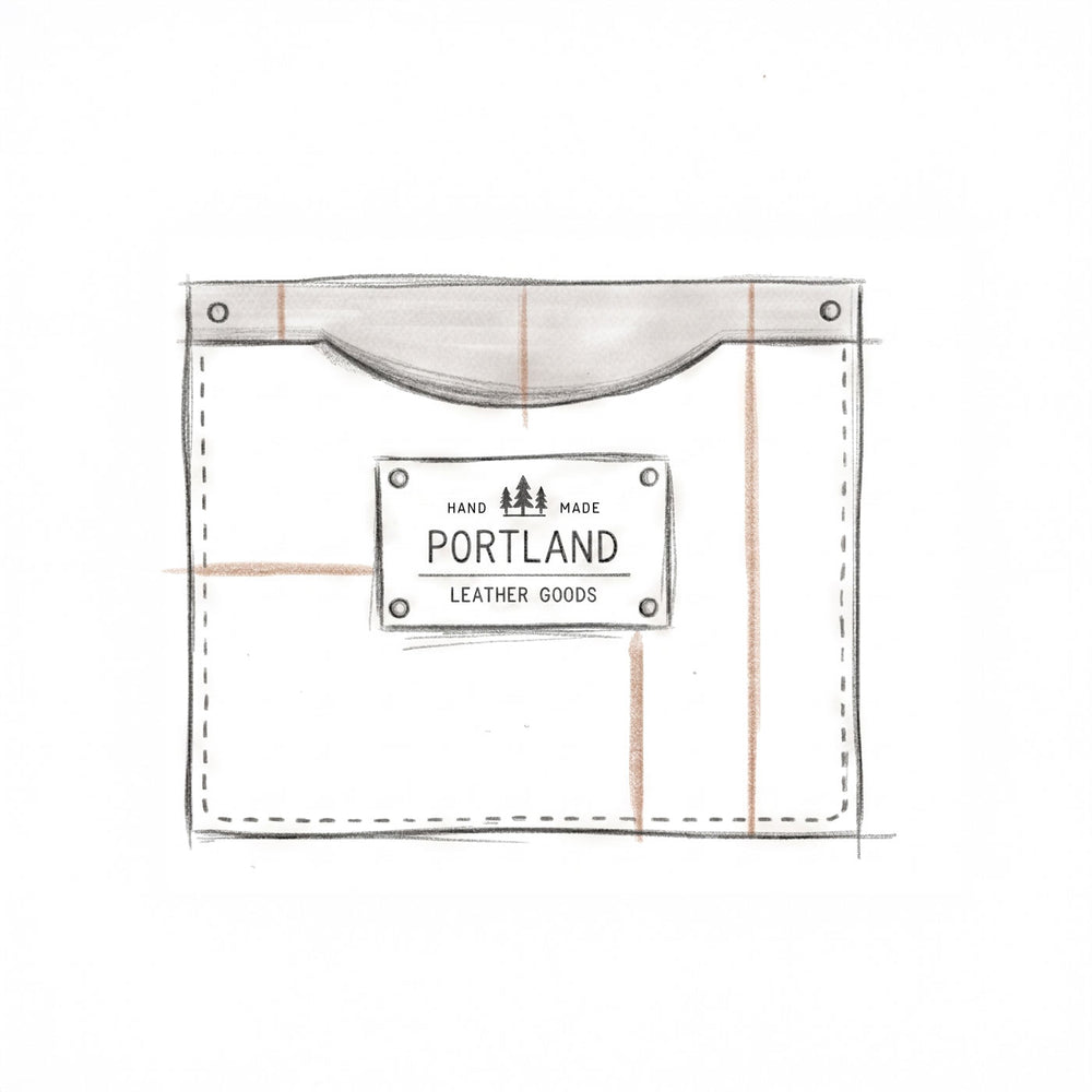 White leather wallet with 'Portland Leather Goods' label on a white background