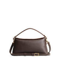 Grizzly | Leather bowler bag with magnetic closure against a white background