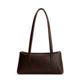 Coldbrew | Leather bowler bag with magnetic closure against a white background