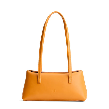 Sunflower | Leather bowler bag with magnetic closure against a white background