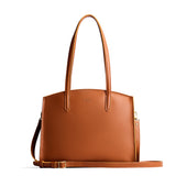 Honey Large | Leather tote bag with handles, adjustable crossbody strap, zipper top, and two back pockets