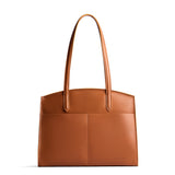 Honey Large | Leather tote bag with handles, adjustable crossbody strap, zipper top, and two back pockets