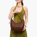 Asheville Medium | U-shaped, flat-bottomed leather shoulder bag with adjustable strap