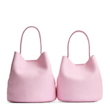 Pinkaboo | Size comparison image of two symmetrical leather bucket bags