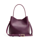 Plum Small | Symmetrical bucket bag with handle, latch closure, and removable crossbody strap
