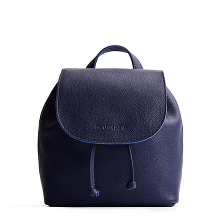 Cobalt | Drawstring bucket backpack with snap closure under flap