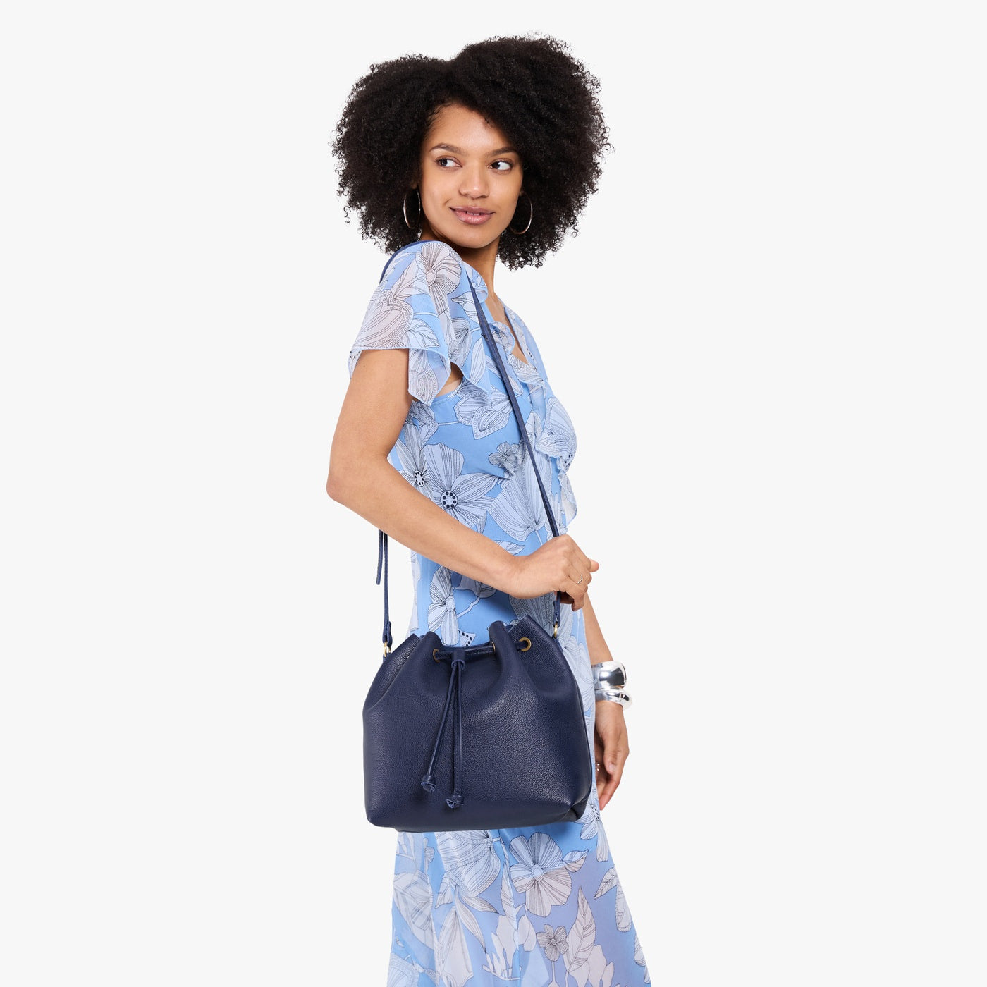Cobalt*Large | Model wearing slouchy crossbody bag with drawstring closure