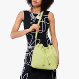 Shadow Lime Large | Model wearing slouchy crossbody bag with drawstring closure