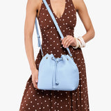 Skyway Large | Model wearing slouchy crossbody bag with drawstring closure