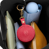 Cherry | Circle-shaped airtag holder keychain with a swivel lobster clasp