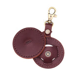 Cognac | Circle-shaped airtag holder keychain with a swivel lobster clasp