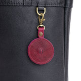 Orchid | Heart-shaped airtag holder keychain with a swivel lobster clasp on bag