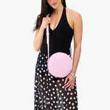 Pinkaboo Large | Model wearing circle shaped crossbody bag with top zipper