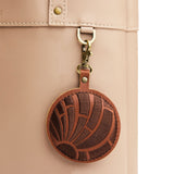 Choco | Concha shaped leather keychain with brown embroidery