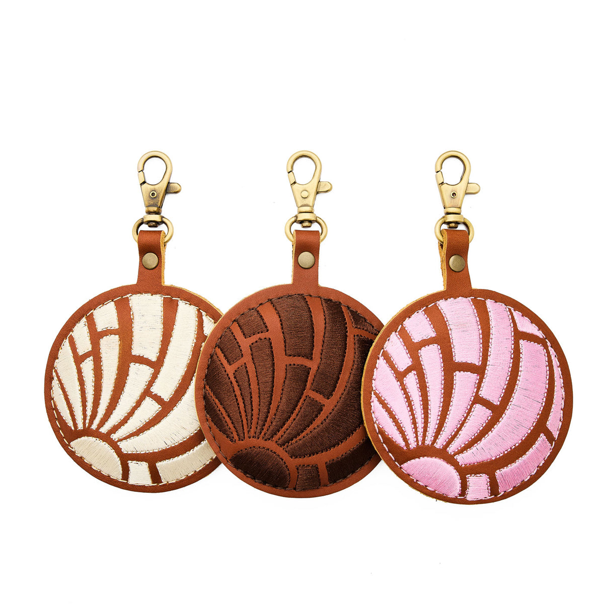 All Variants | Three concha shaped leather keychains with embroidery