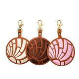 All Variants | Three concha shaped leather keychains with embroidery