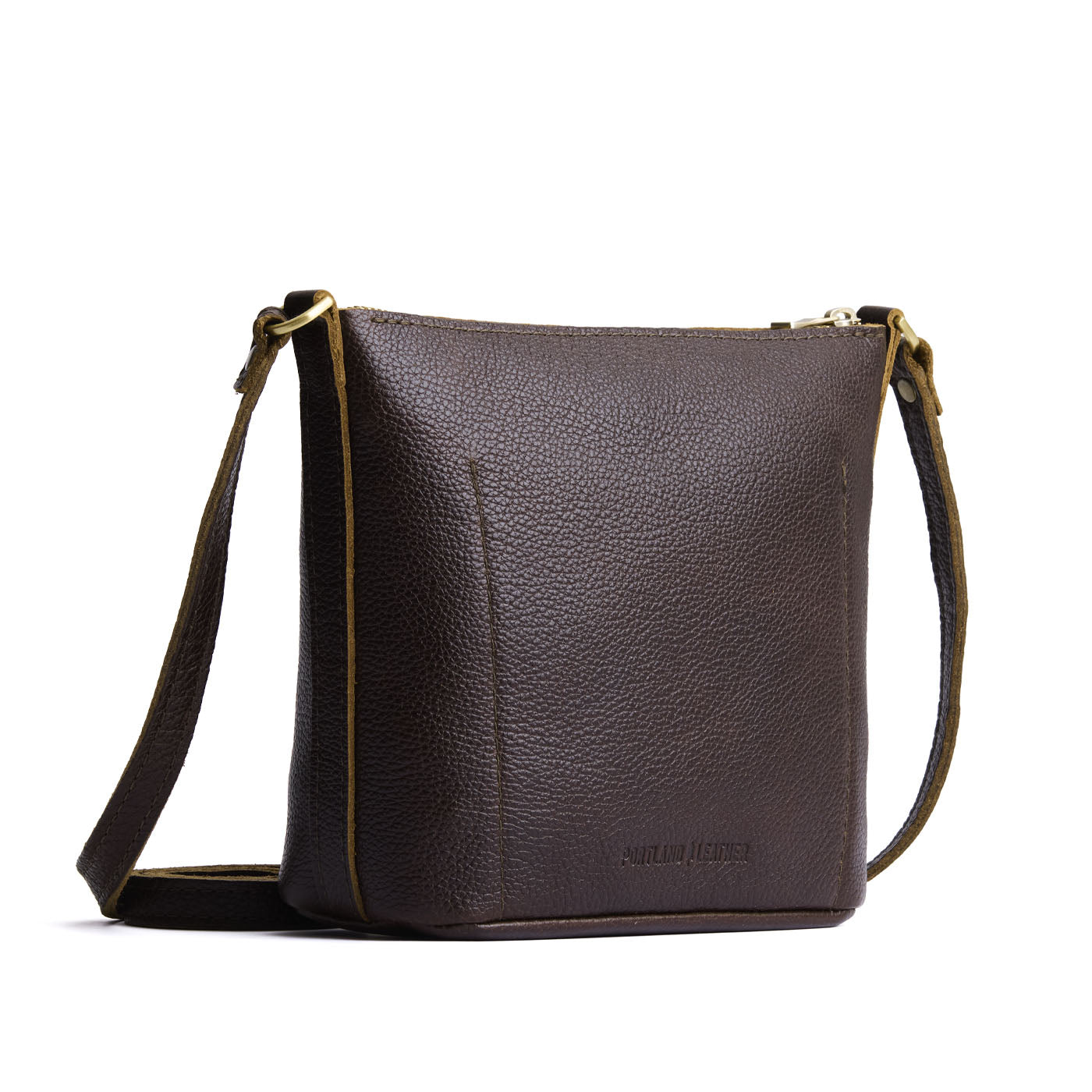 Coldbrew | Rectangular side bag with curved front pocket and metal tree shaped badge