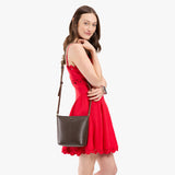 Grizzly | Model wearing rectangular side bag with curved front pocket and metal tree shaped badge