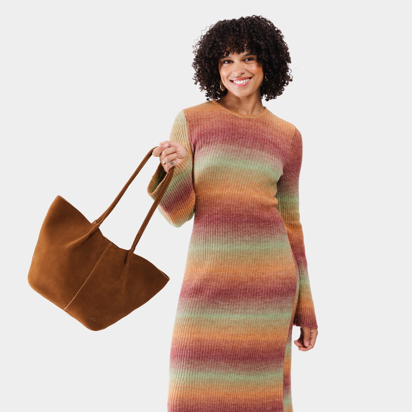 Jackson*Large | Model holding wide bucket shaped tote bag with matching leather handles