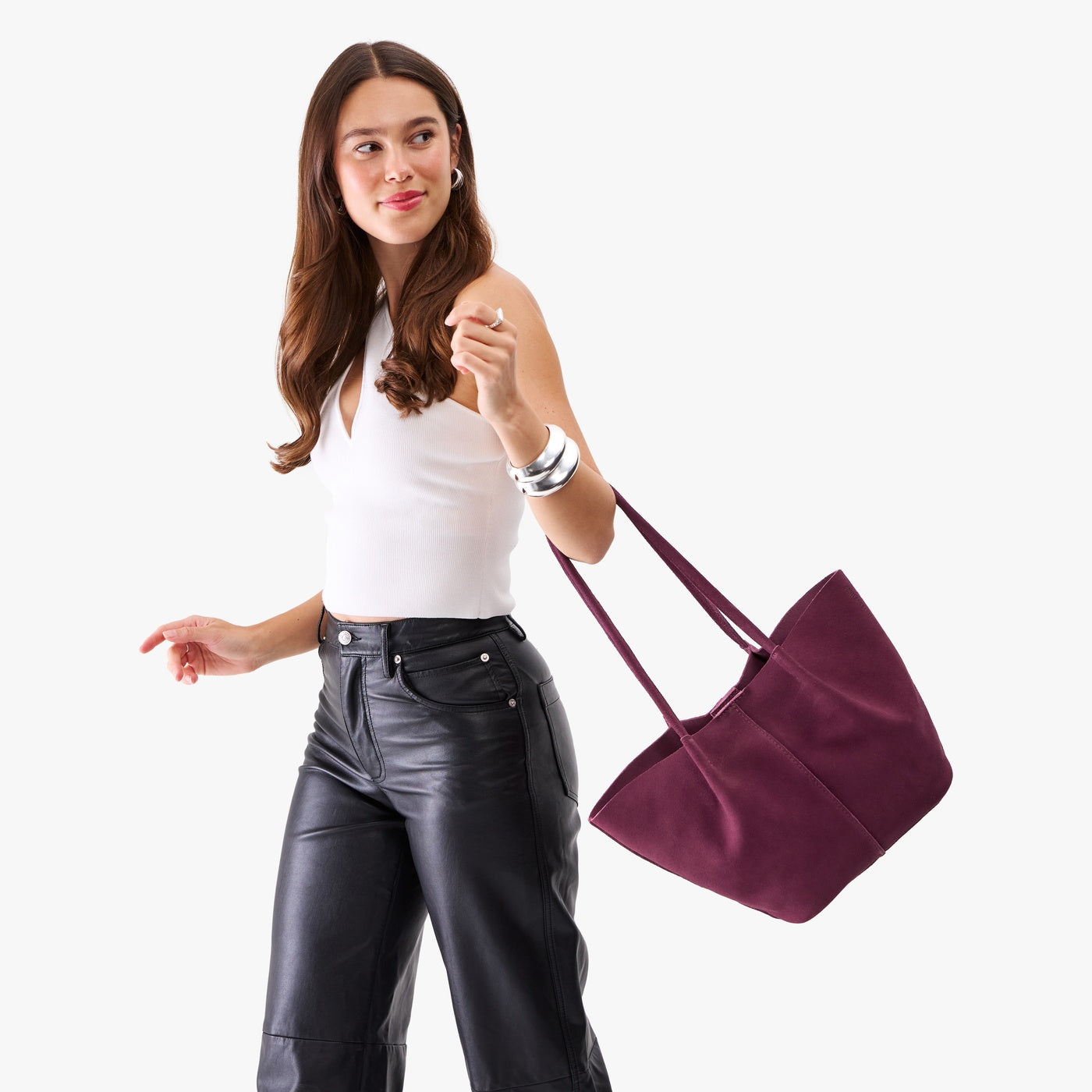 Superbloom*Large | Model holding a  leather tote bag 