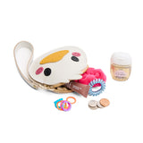 Pearl | Duck-shaped pouch with zipper opening, wristlet and products displayed