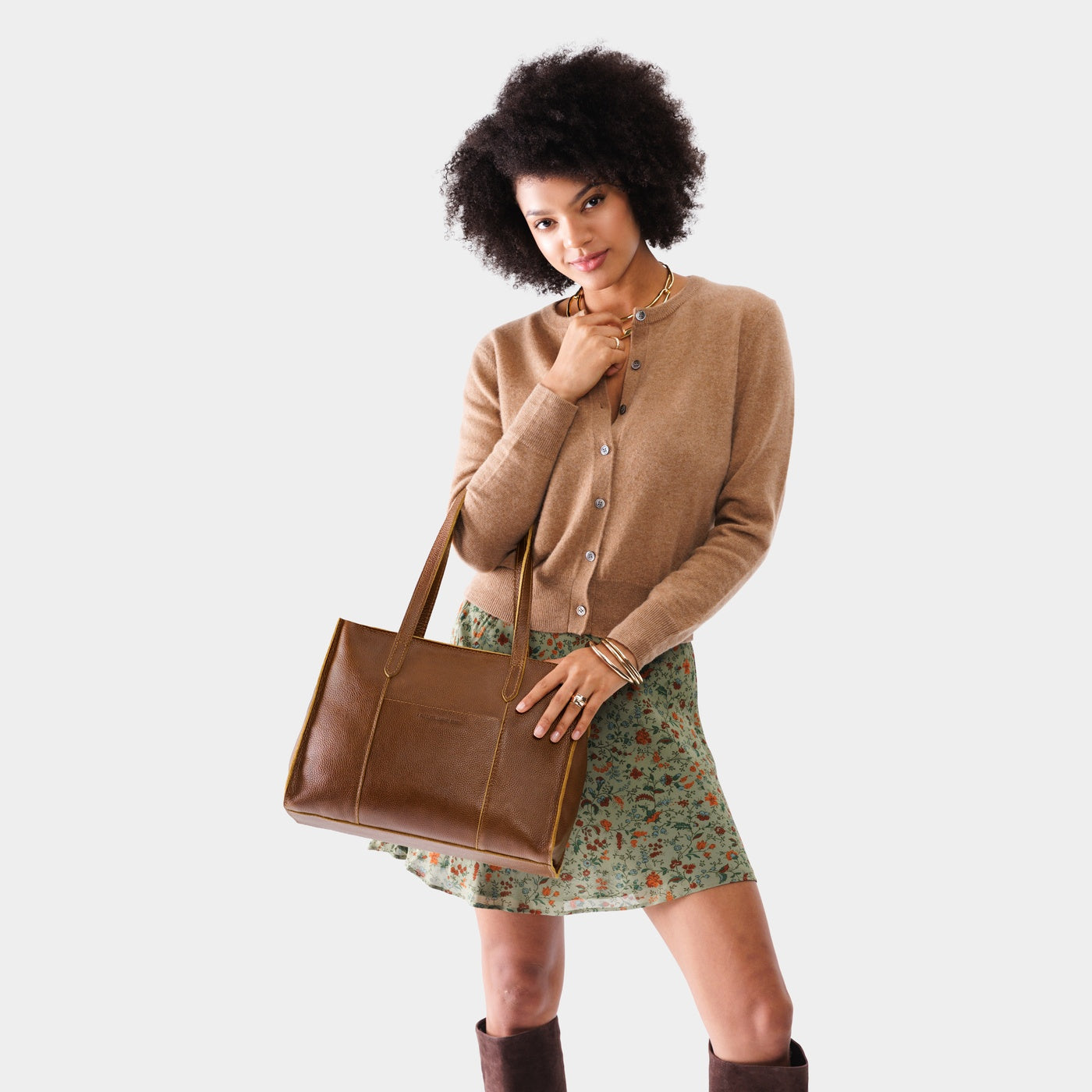 Asheville*East/West | Model wearing structured wide tote bag with overlapping panels and crossbody strap