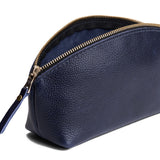 Cobalt | Spacious leather makeup bag with curved seams and top zipper open