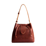 Nutmeg Large | Symmetrical leather bag with leather drawstring closure and adjustable shoulder strap
