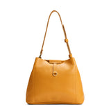 Sunshine Large | Symmetrical leather bag with leather drawstring closure and adjustable shoulder strap