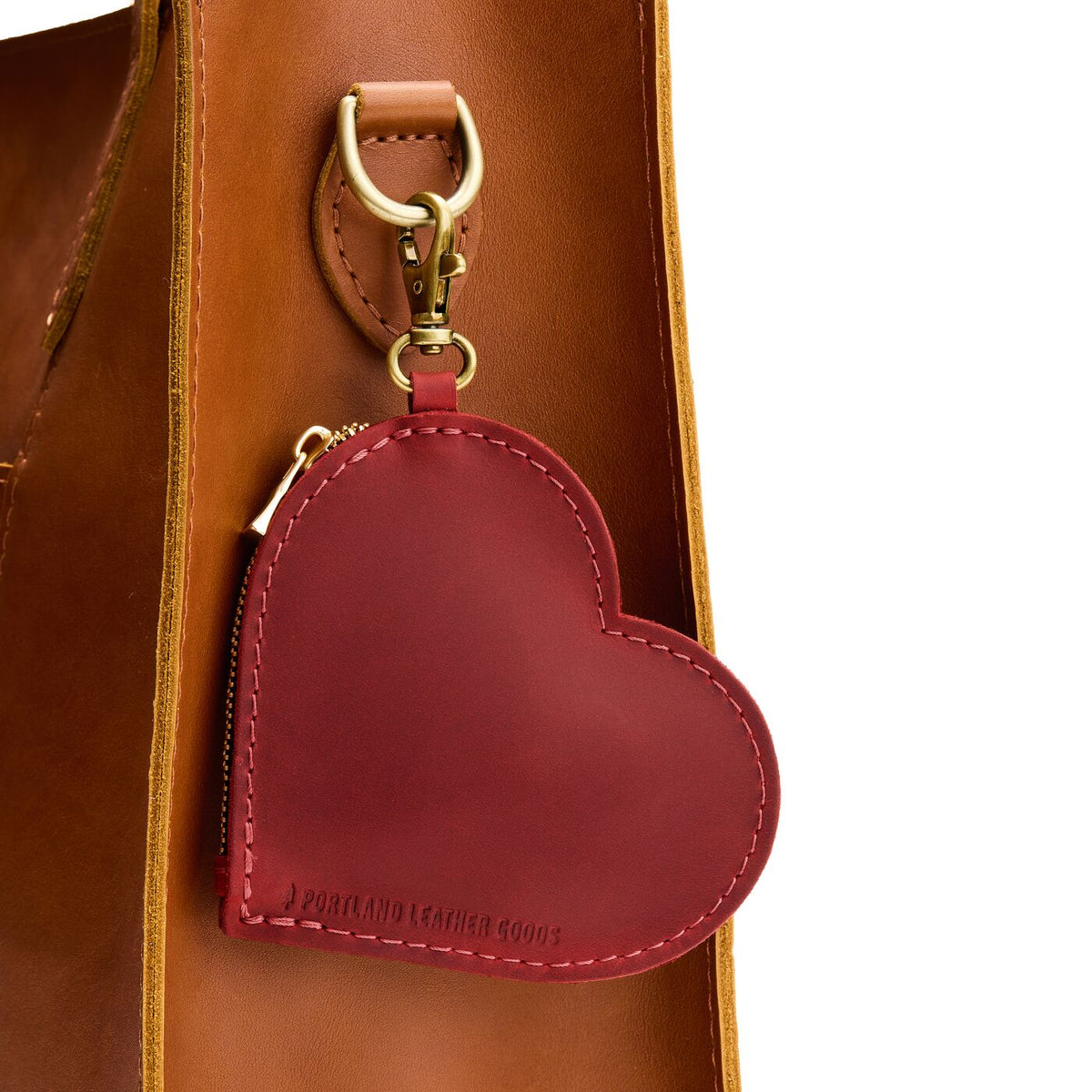Phoenix | Heart-shaped leather pouch keychain with zipper top and lobster clasp