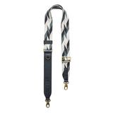 Moonstone | Patterned fabric and leather strap on a white background