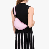 Pinkaboo Small | Model wearing half circle shaped sling bag