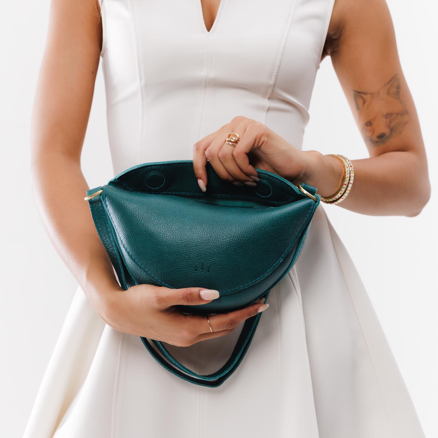 Sea Glass*Small | Model wearing petite half circle shaped sling bag