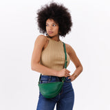 Bacalar Small | Model wearing petite half circle shaped sling bag