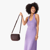 Moose Large | Model wearing a leather Crossbody with a flap and magnetic closure