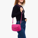 Royalty Large | Model wearing a leather Crossbody with a flap and magnetic closure