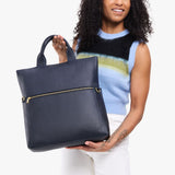 Night Owl Large | Model wearing a convertible tote clutch crossbody