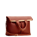 Nutmeg Large  | Convertible tote clutch crossbody with two large front pocket and top carry handles folded into a clutch
