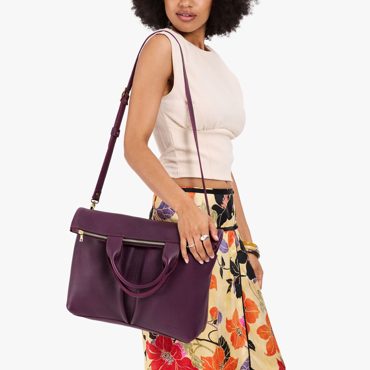 Plum*Large | Model wearing a convertible tote clutch crossbody