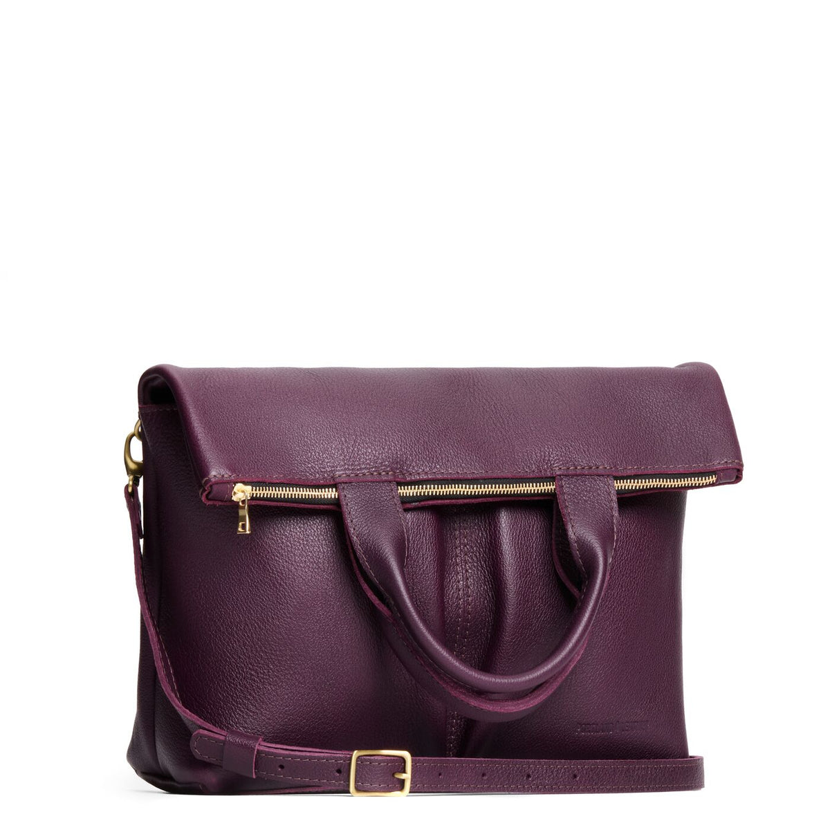 Plum*Large | Convertible tote clutch crossbody with two large front pocket and top carry handles folded into a clutch