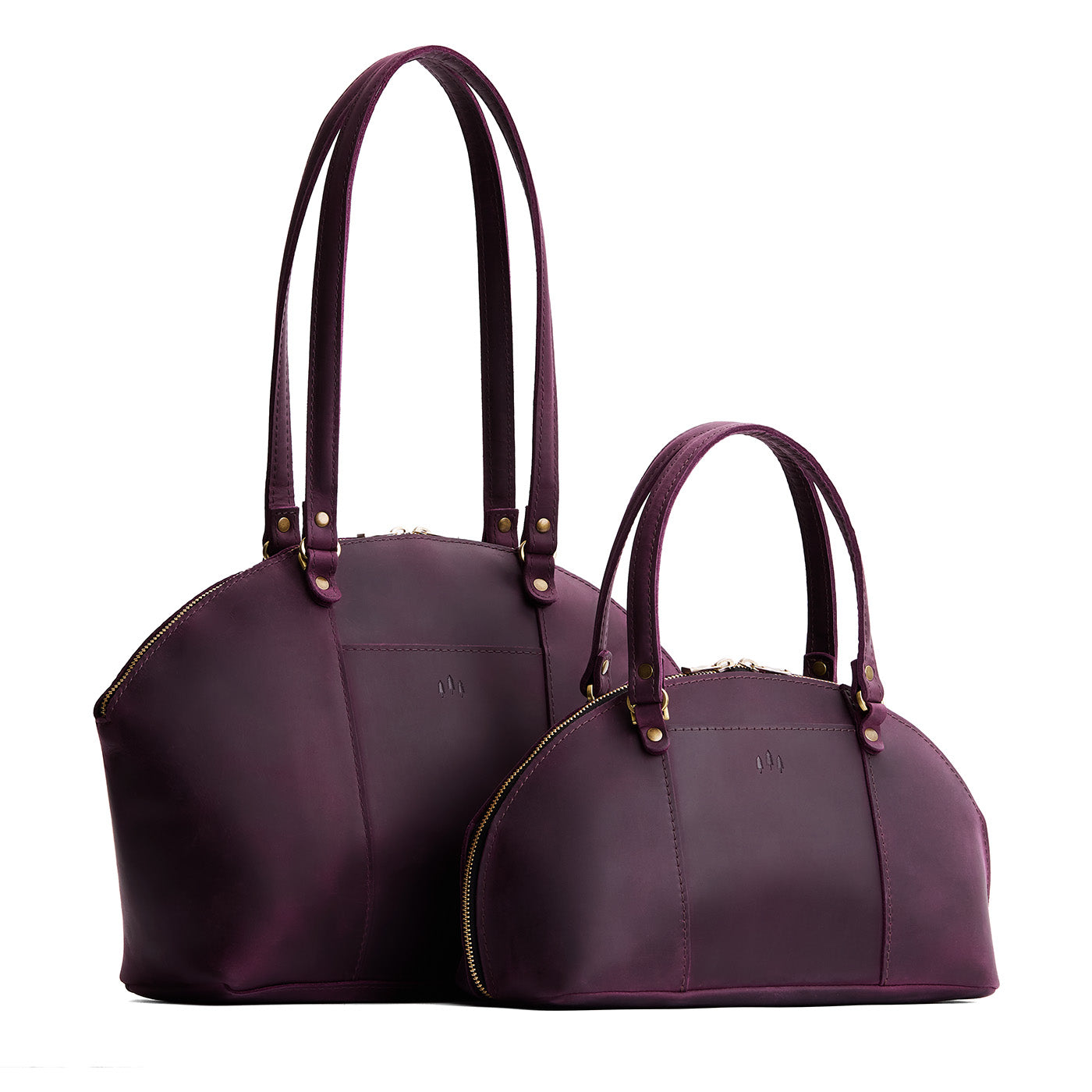 Larkspur | Size comparison of the large and small half circle crossbody bag with handles and removable crossbody strap 