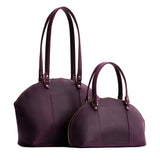 Larkspur | Size comparison of the large and small half circle crossbody bag with handles and removable crossbody strap 