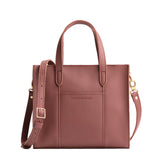 Sunkissed Zipper | Structured mid-size tote bag with overlapping panels and crossbody strap