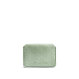 Beetle | Backside of small leather wallet with debossed PLG logo