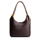 Coldbrew Large | U-shaped, flat-bottomed leather shoulder bag with two outside pockets