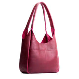 Orchid Large | U-shaped, flat-bottomed leather shoulder bag with two outside pockets