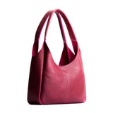 Orchid Medium | U-shaped, flat-bottomed leather shoulder bag with two outside pockets