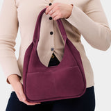 Superbloom Medium | U-shaped, flat-bottomed leather shoulder bag with two outside pockets