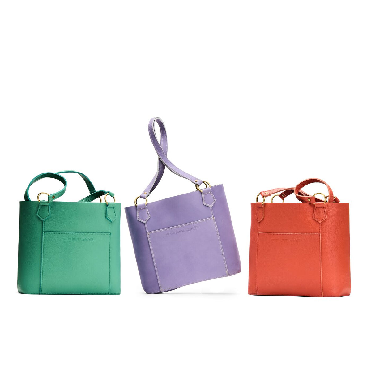 All Variants | Three medium tote bags with antiqued brass toned hardware and front pocket